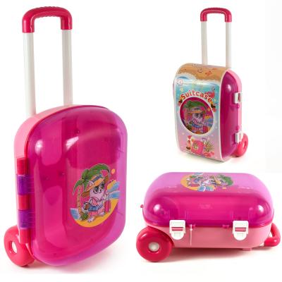 Дитяча рожева валізка