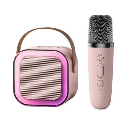 Колонка з бездротовим мікрофоном, функцією зміни голосу, ручкою, Bluetooth, SD, FM та підсвіткою 15см*11см Колонка з бездротовим мікрофоном, функцією зміни голосу, ручкою, Bluetooth, SD, FM та підсвіткою 15см*11см